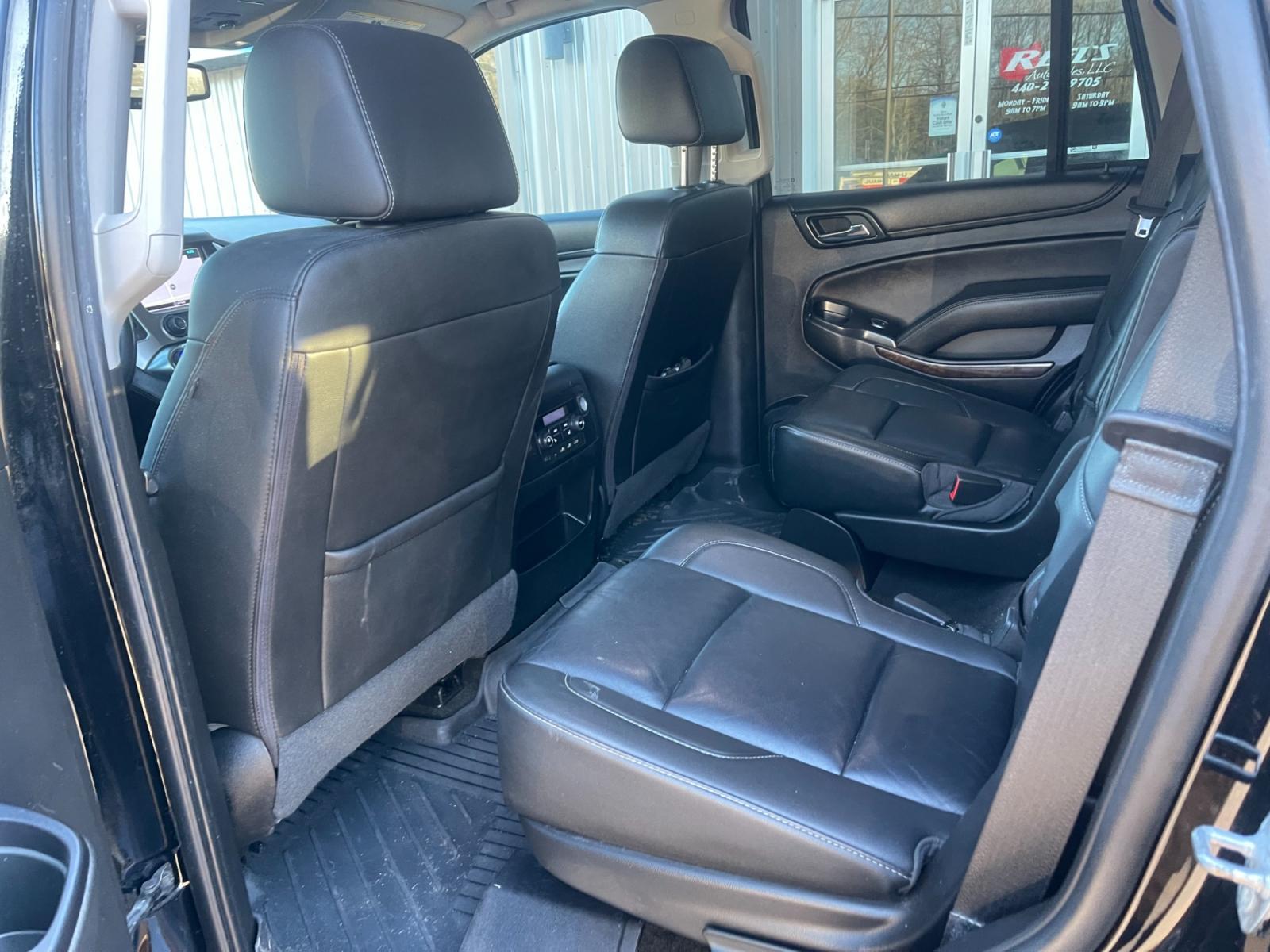2018 Black /Black Chevrolet Tahoe LT 4WD (1GNSKBKC9JR) with an 5.3L V8 OHV 16V engine, 6A transmission, located at 11115 Chardon Rd. , Chardon, OH, 44024, (440) 214-9705, 41.580246, -81.241943 - This 2016 Chevrolet Tahoe LT 4WD is a full-size SUV that comes equipped with an array of high-end features for safety, comfort, and convenience. It includes blind spot monitoring, rear cross traffic alert, and forward collision warning for enhanced safety. The interior boasts heated leather seats, d - Photo #36